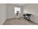 Office space with neutral walls, carpeted floor, and natural light from the window at 8873 Happy Stream Ave, Las Vegas, NV 89143