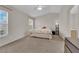 Primary bedroom featuring ceiling fan, neutral walls, and plush carpeting at 8873 Happy Stream Ave, Las Vegas, NV 89143