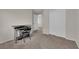 Office space with neutral walls, carpeted floor, and white closet at 8873 Happy Stream Ave, Las Vegas, NV 89143