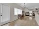 Open breakfast nook with backyard access and a fireplace creates a cozy dining space at 8873 Happy Stream Ave, Las Vegas, NV 89143