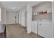 Laundry area featuring side by side washer and dryer, storage and an open layout at 8873 Happy Stream Ave, Las Vegas, NV 89143