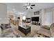 Spacious living room boasts a fireplace and an open layout, ideal for entertaining at 8873 Happy Stream Ave, Las Vegas, NV 89143