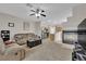Open-concept living area flows seamlessly from the living room to the kitchen at 8873 Happy Stream Ave, Las Vegas, NV 89143