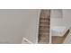 Carpeted staircase leading to the upper level of the home at 8873 Happy Stream Ave, Las Vegas, NV 89143