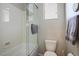 Bathroom with a shower/tub combination and neutral-toned tile surround at 9496 Wild Valley Ave, Las Vegas, NV 89148
