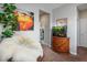 Cozy room featuring unique art, a faux fur beanbag, a fish tank, and neutral decor at 9496 Wild Valley Ave, Las Vegas, NV 89148