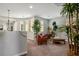 Upstairs living room featuring lots of plants and seating at 9496 Wild Valley Ave, Las Vegas, NV 89148