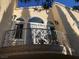 An ornate balcony with wrought iron details overlooks the neighborhood below at , Las Vegas, NV 89117