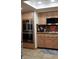This kitchen features light wood cabinets, granite countertops, and stainless steel appliances at , Las Vegas, NV 89117