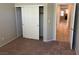 Cozy bedroom with closet and access to the living area at 10195 Queensbury Ave, Las Vegas, NV 89135