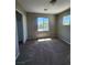 Cozy bedroom with a closet and bright window, offering a comfortable and inviting space at 10400 Beachwalk Pl, Las Vegas, NV 89144