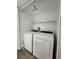 Bright laundry room with white washer and dryer units at 10400 Beachwalk Pl, Las Vegas, NV 89144