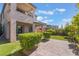 Spacious backyard has manicured lawn and paved area at 10793 Pastel Sunset Ct, Las Vegas, NV 89135