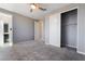 Neutral bedroom offers a closet and adjacent bathroom at 10793 Pastel Sunset Ct, Las Vegas, NV 89135