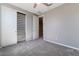 Neutral bedroom features carpet and a closet with built-in shelving at 10793 Pastel Sunset Ct, Las Vegas, NV 89135