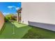 Backyard features a manicured putting green at 10793 Pastel Sunset Ct, Las Vegas, NV 89135
