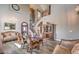 Open-concept dining room showcasing high ceilings, hardwood floors, and a chandelier at 11219 Playa Bonita Ave, Las Vegas, NV 89138