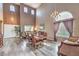 Elegant dining room featuring high ceilings, a chandelier, and a large window at 11219 Playa Bonita Ave, Las Vegas, NV 89138