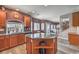 Stylish kitchen features wood cabinets, stainless appliances, and center island at 11219 Playa Bonita Ave, Las Vegas, NV 89138