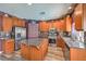 Kitchen featuring granite countertops, stainless steel appliances and ample cabinet space at 11219 Playa Bonita Ave, Las Vegas, NV 89138