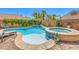 Swimming pool and hot tub in a backyard with desert landscaping at 11219 Playa Bonita Ave, Las Vegas, NV 89138