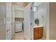 View of a bathroom and a laundry room with washer and dryer appliances at 11420 Ogden Mills Dr # 101, Las Vegas, NV 89135