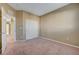 Cozy bedroom featuring a double door closet and neutral color scheme, creating a peaceful retreat at 11420 Ogden Mills Dr # 101, Las Vegas, NV 89135
