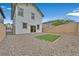 Backyard with low maintenance landscaping and small grass patch at 117 Destiny Orchard Ct, Henderson, NV 89011