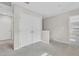 Upstairs hallway with carpet, linen closet and access to the bedrooms at 117 Destiny Orchard Ct, Henderson, NV 89011