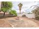 Backyard featuring desert landscaping and privacy fence at 1220 Basin Brook Dr, North Las Vegas, NV 89032