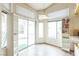 Eat-in kitchen area with tile flooring and large windows providing ample natural light at 1220 Basin Brook Dr, North Las Vegas, NV 89032