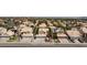 Aerial view of a suburban home showcasing a well-maintained yard and a classic two-car garage at 1246 E Gary Ave, Las Vegas, NV 89123
