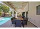 Spacious covered patio featuring an outdoor dining set, perfect for entertaining near the pool at 1246 E Gary Ave, Las Vegas, NV 89123