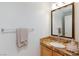 Elegant bathroom featuring a stone countertop, modern fixtures, and ample lighting at 1246 E Gary Ave, Las Vegas, NV 89123