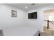 Bright bedroom with plush carpet and mounted television at 1246 E Gary Ave, Las Vegas, NV 89123