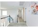 Bright hallway featuring railing and wood flooring at 1246 E Gary Ave, Las Vegas, NV 89123