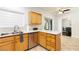 Charming kitchen with stainless steel appliances, tiled backsplash, and bright lighting at 1246 E Gary Ave, Las Vegas, NV 89123