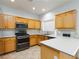Lovely kitchen featuring stainless steel appliances, ample counter space, and light wood cabinetry at 1246 E Gary Ave, Las Vegas, NV 89123