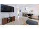 Comfortable living room offering a cozy fireplace and a mounted television at 1246 E Gary Ave, Las Vegas, NV 89123