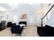 Bright living room featuring an abundance of natural light, modern furniture, and neutral decor at 1246 E Gary Ave, Las Vegas, NV 89123