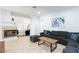 Inviting living room featuring a cozy fireplace and comfortable, modern furnishings at 1246 E Gary Ave, Las Vegas, NV 89123