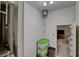 Secured room next to the vault showcasing storage containers, an overhead light, and a glimpse of the entertainment room at 1700 Red Rock St, Las Vegas, NV 89146