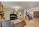 Comfortable living room featuring a piano, elegant staircase, and stylish decor at 1700 Red Rock St, Las Vegas, NV 89146
