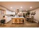 Modern kitchen featuring a central island, ample counter space, and adjacent dining area at 2043 Sombrero Dr, Las Vegas, NV 89169