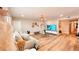 Bright living room with modern decor, wood floors, comfortable seating, and lots of natural light at 2043 Sombrero Dr, Las Vegas, NV 89169