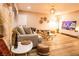 Stylish living room featuring modern decor, hardwood floors, and ample natural light at 2043 Sombrero Dr, Las Vegas, NV 89169