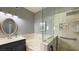 Bathroom featuring a tub, separate walk-in shower, and stylish vanity at 2050 W Warm Springs Rd # 4211, Henderson, NV 89014