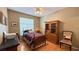 Bedroom with comfortable bed, wood floors, wardrobe, and ample light at 2050 W Warm Springs Rd # 4211, Henderson, NV 89014