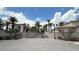 Resort Villa Clubhouse entrance with palm trees and steps at 2050 W Warm Springs Rd # 4211, Henderson, NV 89014
