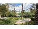 Exterior grounds with manicured trees and plants overlooking the pool area at 2050 W Warm Springs Rd # 4211, Henderson, NV 89014